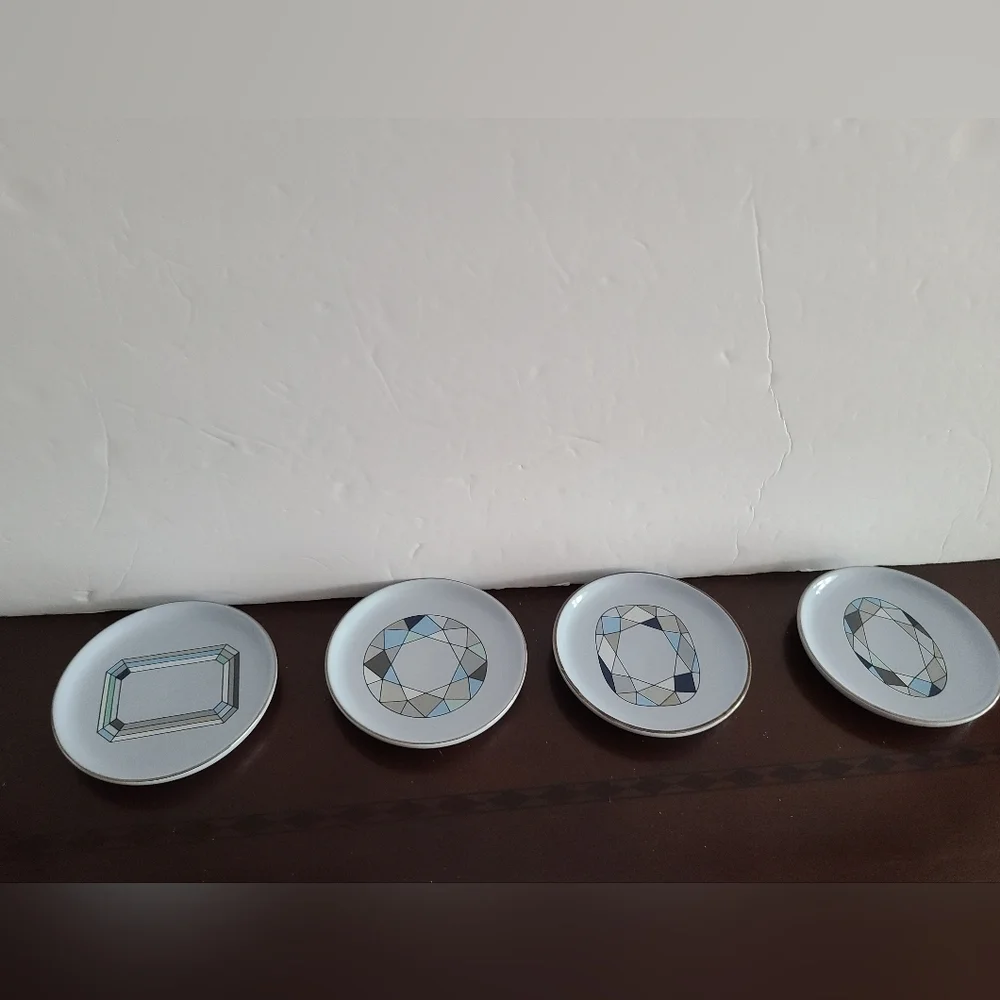 Kwiat jewelry set of 4 ceramic display plates